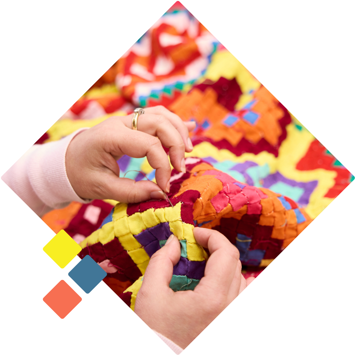 One Wahine (women) sewing a quilt